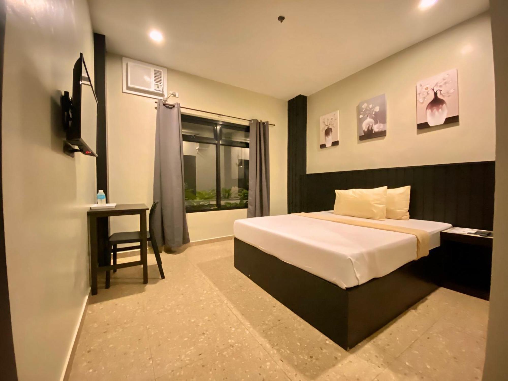 Rudolfo Suites Roxas Extérieur photo